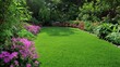 © ME_Photography - A lush green lawn is surrounded by vibrant purple flowers in full bloom, creating a colorful and eye-catching garden scene.
