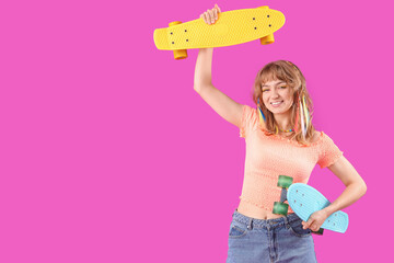 Sticker - Young woman with skateboards on purple background