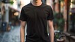 25 year old Model Shirt Mockup, Boy wearing black t-shirt on street in daylight 