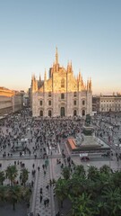 Wall Mural - Milan Italy time lapse, high angle view day to night city skyline at Milano Duomo Cathedral (vertical)