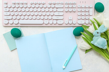 Canvas Print - Composition with blank notebook, modern keyboard and Easter decor on light background