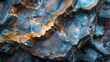 Macro view of a geode with crystal formations in blue and gold tones