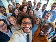 © Steve - Multicultural happy people taking group selfie portrait in the office, diverse people celebrating together, Happy lifestyle and teamwork concept