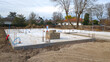 © OceanProd - foundation and plinth concrete is poured work of housing construction