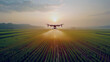 © Ibnu - Portrait of agricultural drone flying over rice field while watering. Irrigation tool equipment in agricultural field. Modern technology solutions for farmer to increase productivity. Generative AI