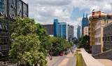 Fototapeta Sypialnia - Nairobi street with modern buildings and skyscrapers