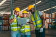 © chokniti - industrial occupation team person working in storage warehouse, business male portrait in logistic storehouse factory for a job of goods box shipping, stock delivery distribution industry to global
