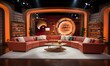 An attractive setting for television interviews, with cushioned seating and sophisticated lighting