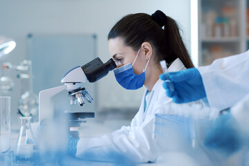 Wall Mural - confident scientist working in the science lab