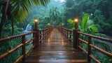 Fototapeta Natura - In Costa Rica's jungle, a narrow footbridge sits between green tropical trees