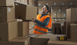 © StockPhotoPro - Warehouse worker lifting a heavy box