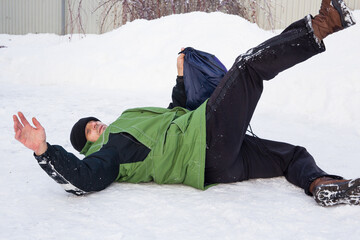  the man fell on a slippery road.