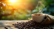 A cup of black coffee with hot vapors rising and a bag with coffee beans scattered on a wooden table. Morning nature background.
