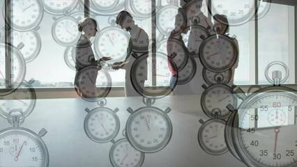 Poster - Animation of moving clocks over diverse colleagues discussing work in office