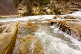 Fototapeta Na ścianę - Wonderful landscape of mountain river and waterfall in Carpathians, Ukraine. Autumn landscape of river Prut in Yaremche.
