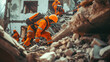 Search and rescue team members in orange uniforms sift through building rubble.