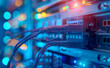closeup of network switch and blue cable in data center, blurred background