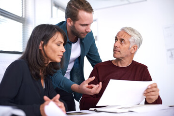 Wall Mural - Architecture, planning and business people in meeting with paperwork, discussion and blueprint for building project. Civil engineering, development and teamwork, men and woman in office brainstorming