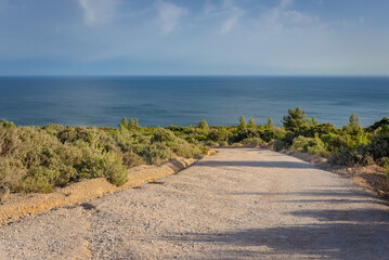 Wall Mural - Road to Ribeira do Cavalo beach in Arrabida Natural Park near Sesimbra town, Portugal