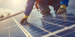 © Lahiru - photovoltaic solar panel installation on a house roof by a worker, technician or engineer. Close-up view. Alternative, renewable energy concept. Sustainable energy for home.