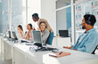 © Rene La/peopleimages.com - Call center, computer training and people or manager with technical support, system management and online learning. Business mentor, tech agency and consultant talking or helping on laptop in office
