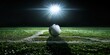 Soccer ball at the kickoff spot under a spotlight, focus on the game.
