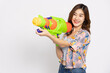 Young Asian woman in summer outfits holding water guns plastic for Songkran festival in Thailand isolated on white background