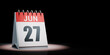 June 27 Calendar Spotlighted on Black Background