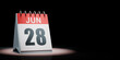 June 28 Calendar Spotlighted on Black Background