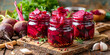 Glass jars filled with pickled beetroots on a rustic wooden table, accompanied by garlic and spices