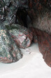 The metamorphic rock serpentine in a sea cave at Kynance Cove Cornwall