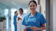 © MP Studio - female healthcare professional in blue scrubs with a stethoscope around her neck