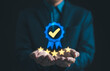 © Supatman - Standard quality control certification assurance guarantee concept. Hand show sign of top service quality assurance 5 star, approve certificate, Quality assurance QA, QC, Compliance with regulations,