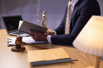 young lawyer was flipping through Bible in his legal office just to learn about God teachings from the Bible and to be reminded to do what is right. The concept of belief and the power of faith in God