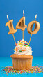 Candle number 140 - Cupcake birthday in blue background