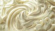 A close up of a bowl of whipped cream. Perfect for food and dessert concepts