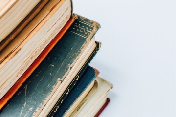 Poster - A stack of books sitting on top of each other. Ideal for educational or literary concepts