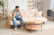 © Pixel-Shot - Mature man suffering from migraine at home