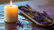 lit candle and lavender in spa