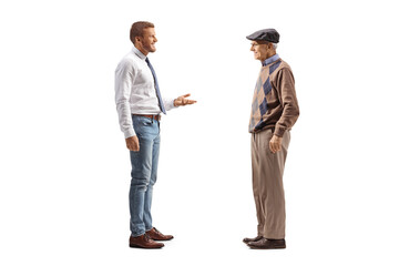 Sticker - Professional man in jeans and white shirt standing and talking to an elderly man