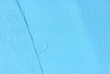 Fototapeta Zwierzęta - light blue hemp viscose natural fabric cloth color, sackcloth rough texture of textile fashion abstract background