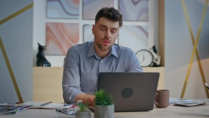 Poster - Overworked guy looking computer monitor at buro closeup. Man looking solution