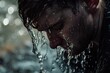 Intense close-up of a man's face being splashed with water, capturing the raw emotion and dynamic movement of liquid in high detail.

