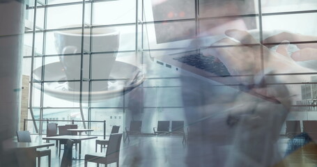 Wall Mural - Image of hands of woman working on laptop over sped up commuters walking in modern building