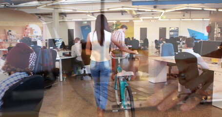 Poster - Image of hands using laptop, over colleagues at creative office with bike and on hoverboard