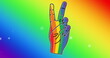 Image of rainbow hand with victory sign over rainbow background