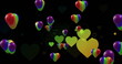 Image of rainbow hearts over black background