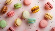 Colorful macaron cake with falling macaroons and minimal concept on white background