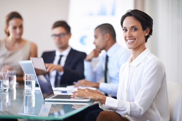 Sticker - Woman, office and smile in meeting with laptop to brainstorm for contract, paperwork and teamwork or collaboration. Business people, boardroom and table with strategy, feedback and company growth.