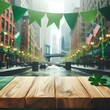 Wooden empty tabletop on blurred city street background with green holiday garlands and St.